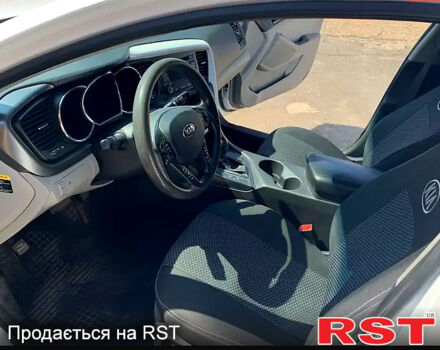 Белый Киа Оптима, объемом двигателя 2.4 л и пробегом 197 тыс. км за 9000 $, фото 4 на Automoto.ua