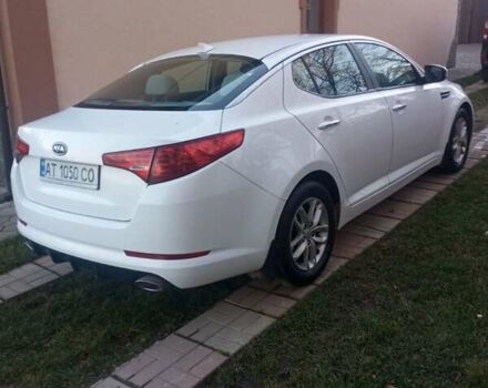 Білий Кіа Оптіма, об'ємом двигуна 2.36 л та пробігом 118 тис. км за 9300 $, фото 2 на Automoto.ua