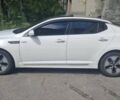 Білий Кіа Оптіма, об'ємом двигуна 2.4 л та пробігом 340 тис. км за 9000 $, фото 4 на Automoto.ua