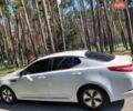 Білий Кіа Оптіма, об'ємом двигуна 2.36 л та пробігом 256 тис. км за 10300 $, фото 1 на Automoto.ua