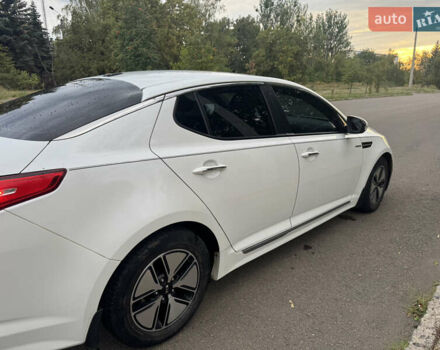 Білий Кіа Оптіма, об'ємом двигуна 2.36 л та пробігом 230 тис. км за 8300 $, фото 2 на Automoto.ua