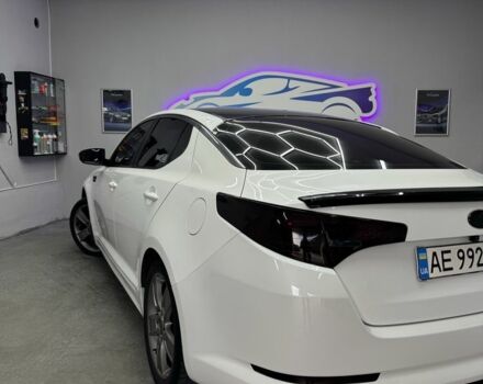 Белый Киа Оптима, объемом двигателя 2 л и пробегом 260 тыс. км за 8500 $, фото 1 на Automoto.ua