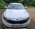 Білий Кіа Оптіма, об'ємом двигуна 2 л та пробігом 200 тис. км за 9500 $, фото 1 на Automoto.ua