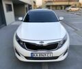 Белый Киа Оптима, объемом двигателя 2 л и пробегом 273 тыс. км за 10238 $, фото 1 на Automoto.ua