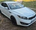 Белый Киа Оптима, объемом двигателя 2.36 л и пробегом 150 тыс. км за 8000 $, фото 1 на Automoto.ua