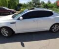 Белый Киа Оптима, объемом двигателя 2.4 л и пробегом 165 тыс. км за 10500 $, фото 4 на Automoto.ua