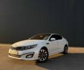 Белый Киа Оптима, объемом двигателя 2 л и пробегом 280 тыс. км за 9500 $, фото 1 на Automoto.ua
