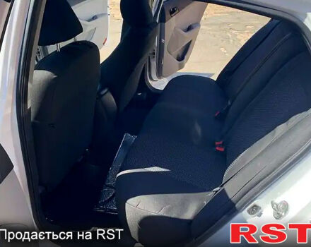 Белый Киа Оптима, объемом двигателя 2.4 л и пробегом 197 тыс. км за 9000 $, фото 5 на Automoto.ua