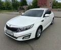 Белый Киа Оптима, объемом двигателя 2 л и пробегом 140 тыс. км за 7950 $, фото 1 на Automoto.ua