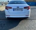 Білий Кіа Оптіма, об'ємом двигуна 2 л та пробігом 245 тис. км за 8900 $, фото 1 на Automoto.ua