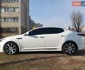 Белый Киа Оптима, объемом двигателя 2 л и пробегом 153 тыс. км за 11700 $, фото 1 на Automoto.ua