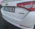 Білий Кіа Оптіма, об'ємом двигуна 2.36 л та пробігом 280 тис. км за 10500 $, фото 4 на Automoto.ua