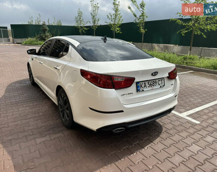 Білий Кіа Оптіма, об'ємом двигуна 2.4 л та пробігом 185 тис. км за 10222 $, фото 14 на Automoto.ua