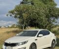 Білий Кіа Оптіма, об'ємом двигуна 2 л та пробігом 197 тис. км за 9498 $, фото 1 на Automoto.ua