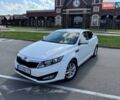 Белый Киа Оптима, объемом двигателя 2.36 л и пробегом 100 тыс. км за 8000 $, фото 1 на Automoto.ua