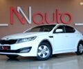 Белый Киа Оптима, объемом двигателя 2 л и пробегом 200 тыс. км за 6900 $, фото 1 на Automoto.ua