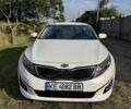 Білий Кіа Оптіма, об'ємом двигуна 2 л та пробігом 197 тис. км за 9498 $, фото 1 на Automoto.ua
