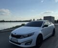 Белый Киа Оптима, объемом двигателя 2 л и пробегом 150 тыс. км за 10000 $, фото 1 на Automoto.ua