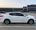 Білий Кіа Оптіма, об'ємом двигуна 2 л та пробігом 129 тис. км за 8999 $, фото 1 на Automoto.ua