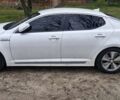 Білий Кіа Оптіма, об'ємом двигуна 2.4 л та пробігом 296 тис. км за 11800 $, фото 1 на Automoto.ua