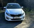 Білий Кіа Оптіма, об'ємом двигуна 2.4 л та пробігом 142 тис. км за 10300 $, фото 1 на Automoto.ua