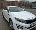 Белый Киа Оптима, объемом двигателя 2.4 л и пробегом 141 тыс. км за 10000 $, фото 1 на Automoto.ua