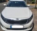 Белый Киа Оптима, объемом двигателя 2.4 л и пробегом 196 тыс. км за 10800 $, фото 1 на Automoto.ua
