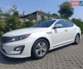 Білий Кіа Оптіма, об'ємом двигуна 2.36 л та пробігом 208 тис. км за 9999 $, фото 1 на Automoto.ua