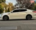 Белый Киа Оптима, объемом двигателя 2.4 л и пробегом 240 тыс. км за 9000 $, фото 1 на Automoto.ua
