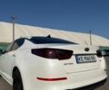 Білий Кіа Оптіма, об'ємом двигуна 2.36 л та пробігом 150 тис. км за 9800 $, фото 1 на Automoto.ua