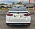 Білий Кіа Оптіма, об'ємом двигуна 2.36 л та пробігом 168 тис. км за 10900 $, фото 4 на Automoto.ua