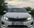 Білий Кіа Оптіма, об'ємом двигуна 2.4 л та пробігом 165 тис. км за 10497 $, фото 1 на Automoto.ua
