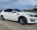 Белый Киа Оптима, объемом двигателя 2 л и пробегом 132 тыс. км за 9900 $, фото 1 на Automoto.ua