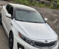 Білий Кіа Оптіма, об'ємом двигуна 2.4 л та пробігом 165 тис. км за 10497 $, фото 1 на Automoto.ua