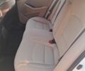 Белый Киа Оптима, объемом двигателя 2.4 л и пробегом 165 тыс. км за 9400 $, фото 4 на Automoto.ua