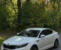 Білий Кіа Оптіма, об'ємом двигуна 2 л та пробігом 258 тис. км за 9000 $, фото 1 на Automoto.ua
