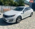 Білий Кіа Оптіма, об'ємом двигуна 2.36 л та пробігом 280 тис. км за 8800 $, фото 1 на Automoto.ua