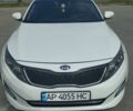 Белый Киа Оптима, объемом двигателя 2 л и пробегом 235 тыс. км за 11000 $, фото 1 на Automoto.ua