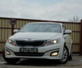 Білий Кіа Оптіма, об'ємом двигуна 2 л та пробігом 150 тис. км за 10900 $, фото 1 на Automoto.ua