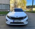 Белый Киа Оптима, объемом двигателя 2.4 л и пробегом 340 тыс. км за 9499 $, фото 1 на Automoto.ua