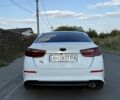 Белый Киа Оптима, объемом двигателя 2 л и пробегом 150 тыс. км за 10000 $, фото 2 на Automoto.ua