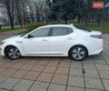 Белый Киа Оптима, объемом двигателя 2.36 л и пробегом 258 тыс. км за 10300 $, фото 5 на Automoto.ua
