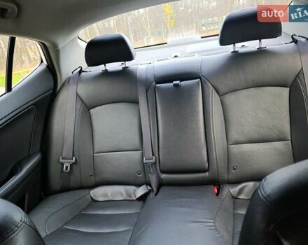 Белый Киа Оптима, объемом двигателя 2.36 л и пробегом 258 тыс. км за 10300 $, фото 33 на Automoto.ua