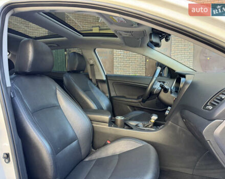 Белый Киа Оптима, объемом двигателя 2.36 л и пробегом 205 тыс. км за 11500 $, фото 11 на Automoto.ua