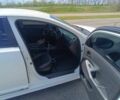 Белый Киа Оптима, объемом двигателя 2 л и пробегом 280 тыс. км за 10400 $, фото 12 на Automoto.ua