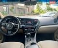 Білий Кіа Оптіма, об'ємом двигуна 2.36 л та пробігом 180 тис. км за 11000 $, фото 8 на Automoto.ua