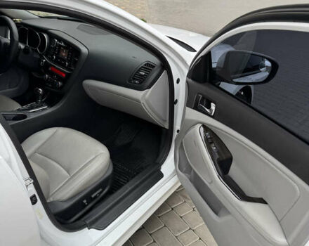 Білий Кіа Оптіма, об'ємом двигуна 2.4 л та пробігом 167 тис. км за 11800 $, фото 10 на Automoto.ua