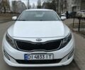 Белый Киа Оптима, объемом двигателя 2.4 л и пробегом 141 тыс. км за 10000 $, фото 1 на Automoto.ua