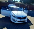 Білий Кіа Оптіма, об'ємом двигуна 2.4 л та пробігом 178 тис. км за 10500 $, фото 1 на Automoto.ua