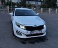 Белый Киа Оптима, объемом двигателя 2.4 л и пробегом 240 тыс. км за 6900 $, фото 1 на Automoto.ua